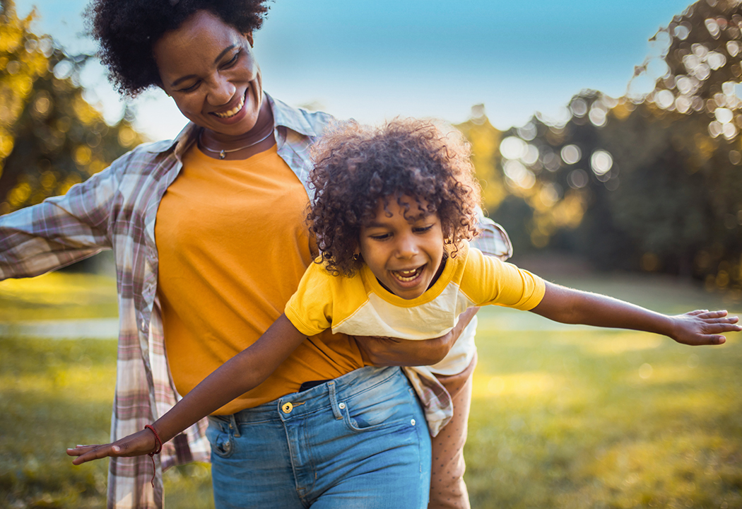 mother holding child, personal banking Keen Bank